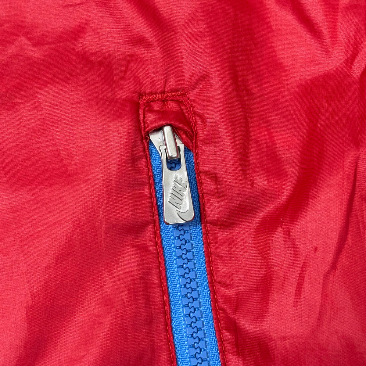 NIKE SPORTSWEAR WINDBREAKER