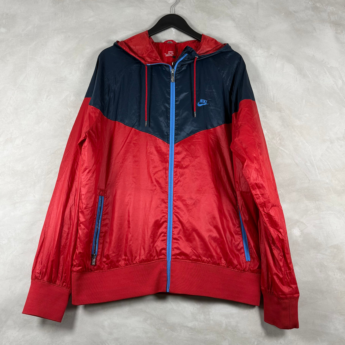 NIKE SPORTSWEAR WINDBREAKER