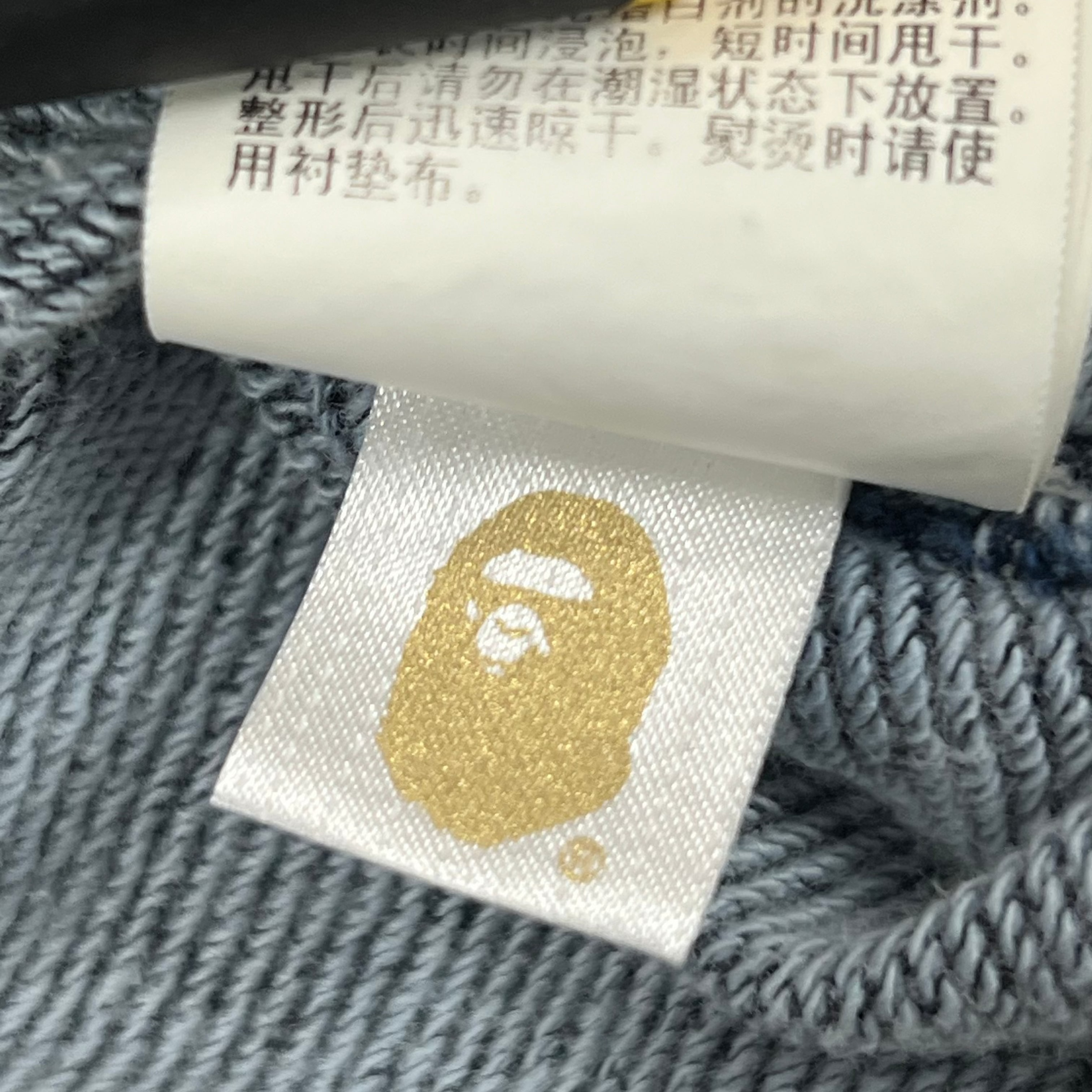 BAPE "BUSY WORKS" EMBOSSED LOGO SWEATSHIRT