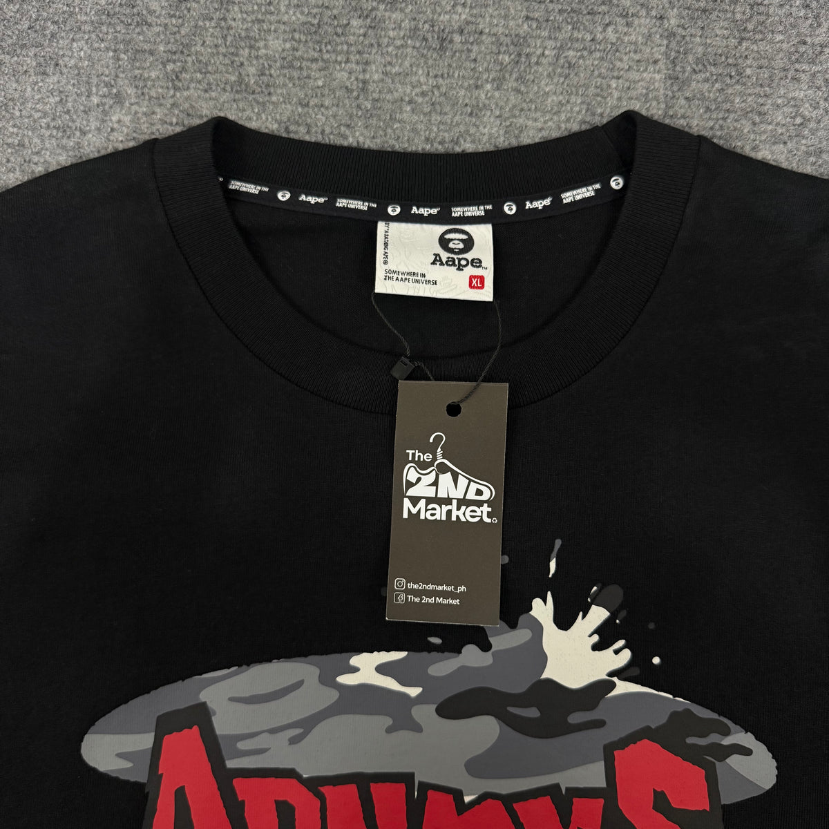 AAPE "AAPEUNVS" TEE