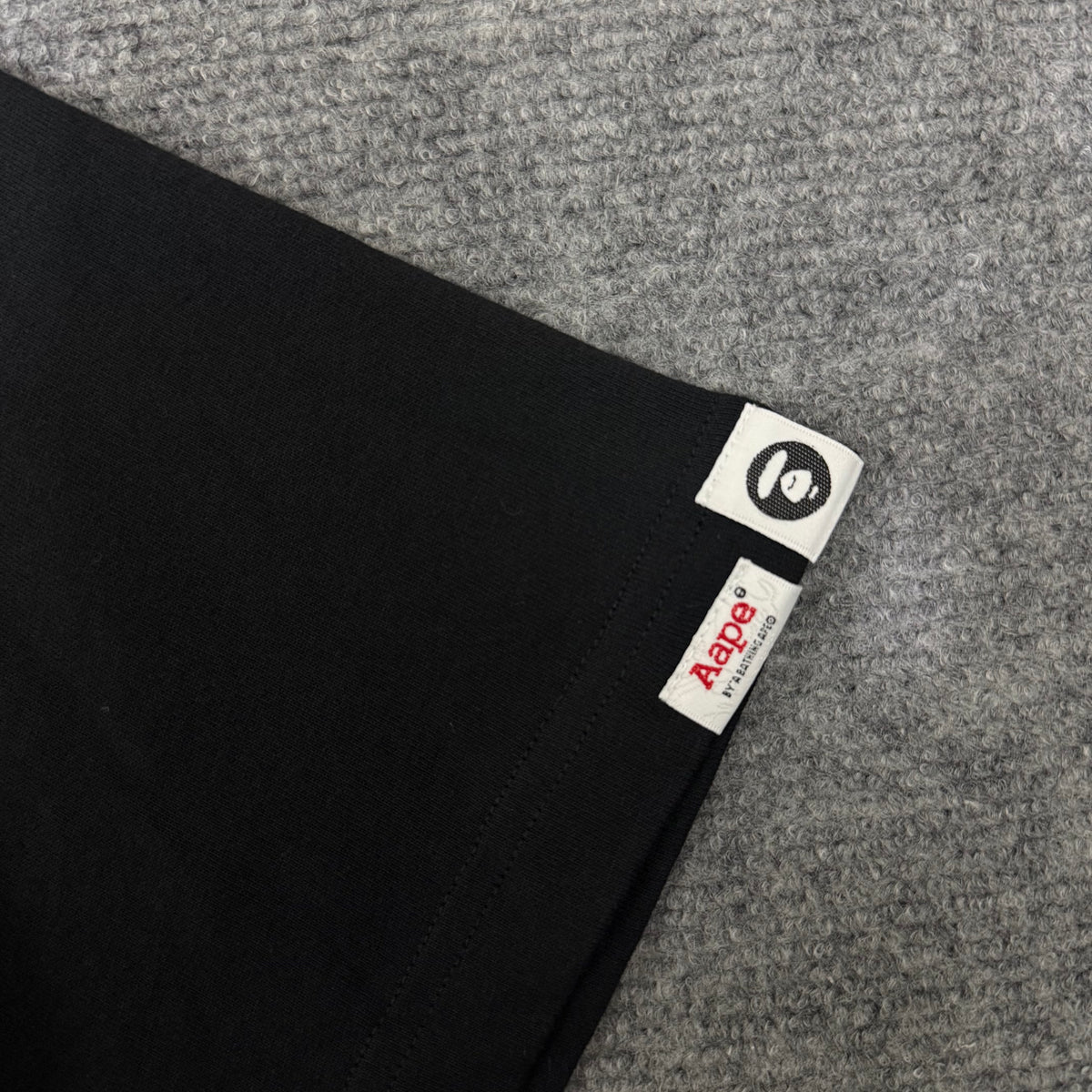 AAPE "AAPEUNVS" TEE