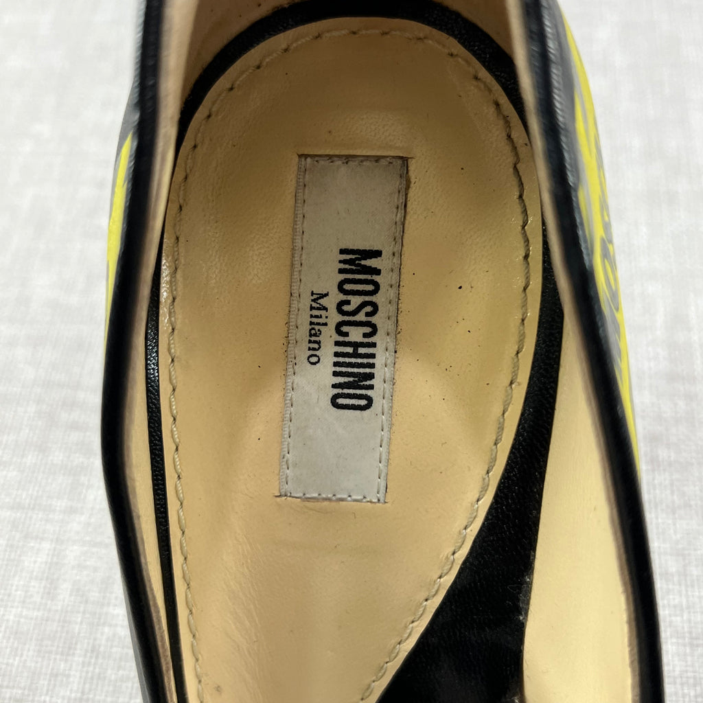 MOSCHINO CAUTION PRINTED LEATHER PUMPS