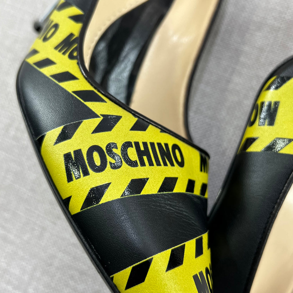 MOSCHINO CAUTION PRINTED LEATHER PUMPS