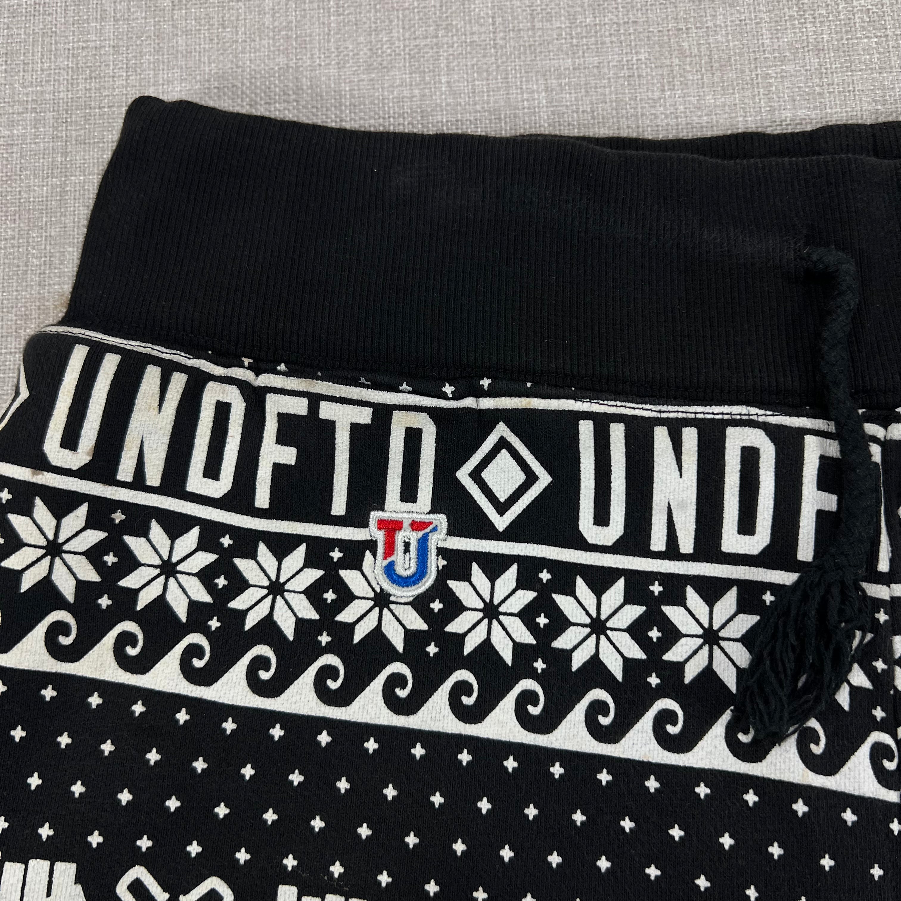 UNDEFEATED NBA HOLIDAY AOP SHORTS
