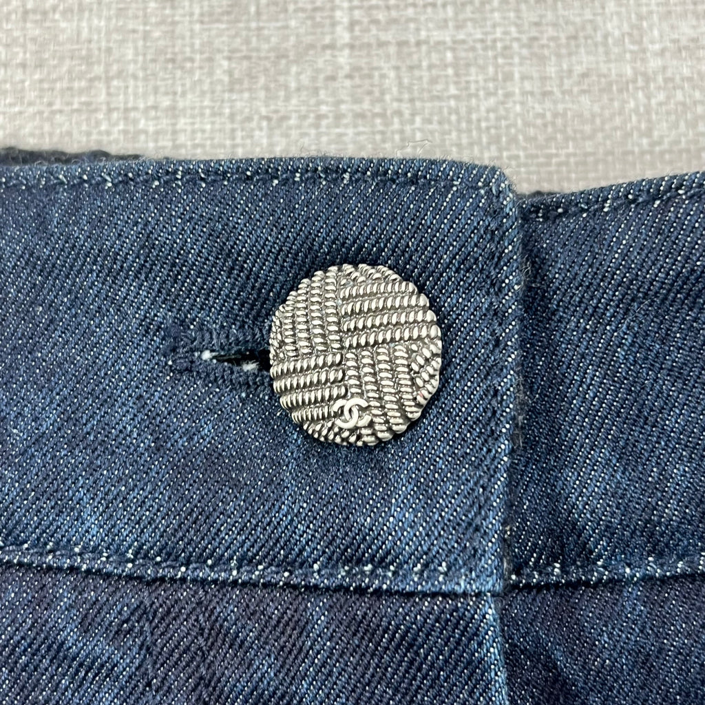 CHANEL DENIM SHORT FEATURE A SIGNATURE COCOMARK BUTTON