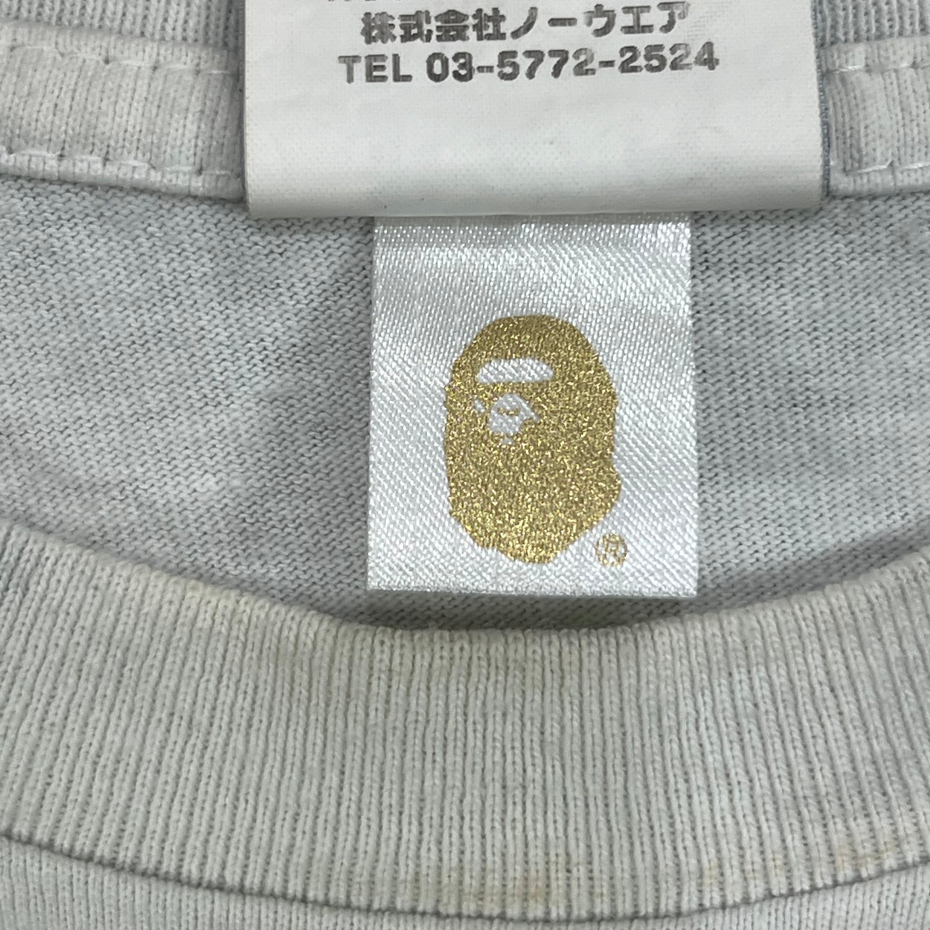 BAPE X F.C.R.B. MULTI CAMO COLLEGE TEE